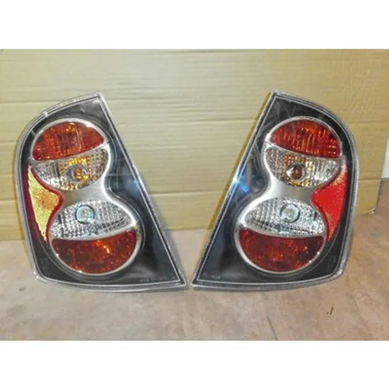 Stop Spate SKODA FABIA 1 1999->2008 Lampa stop spate LEXUS negru pentru 3/5 usi Perioada 1999 2000 2001 2002 2003 2004 2005 2006 2007 2008